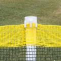Roll-A-Fence Knitted Polyethylene Fence - Rolled Barrier & Outfield Fencing - Black - BF05-66Black (Green With Yellow Top Installation Example Shown)
